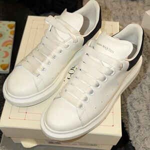100% authentic women’s Alexander McQueen White Sneakers with Black Trim